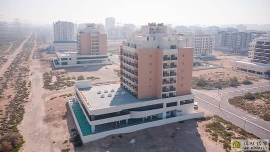 1 Bedroom Apartment for Rent in International City, Dubai - Building-6. jpg