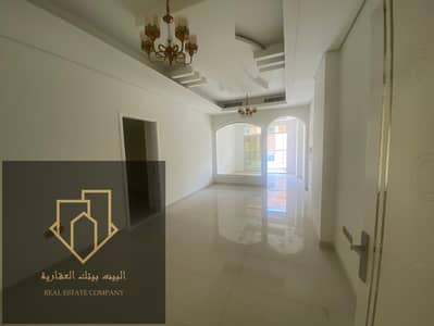 For rent in Ajman - Al Mowaihat area:  Two bedrooms and a spacious living room with wall-mounted closets. Free gym and swimming pool. Payment faciliti