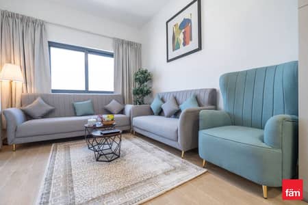 2 Bedroom Apartment for Rent in Wasl Gate, Dubai - Immaculate | Cozy | Community Living- Furnished