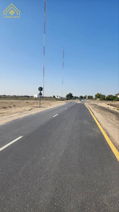 Mixed Use Land for Sale in Al Abraq 1, Umm Al Quwain - For sale two residential investment lands with an area of ​​6000 feet, Umm Al Quwain - Al Abraq, next to Al Salamah