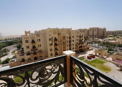 1 Bedroom Apartment for Rent in Remraam, Dubai - Closed kitchen | spacious | family community
