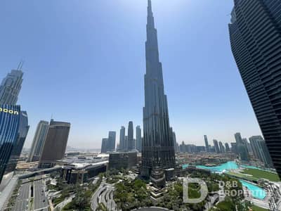 1 Bedroom Apartment for Rent in Downtown Dubai, Dubai - Burj Khalifa and Fountain View | High Floor