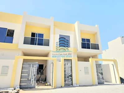 A villa in the best residential locations in the Al Zahia area, behind a mosque with a garden in front of it. The villa is directly on Sheikh Mohammed