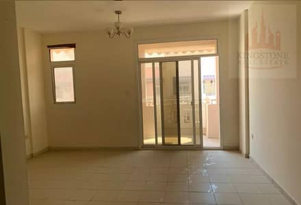 1 Bedroom Apartment for Sale in International City, Dubai - living room2. jpg