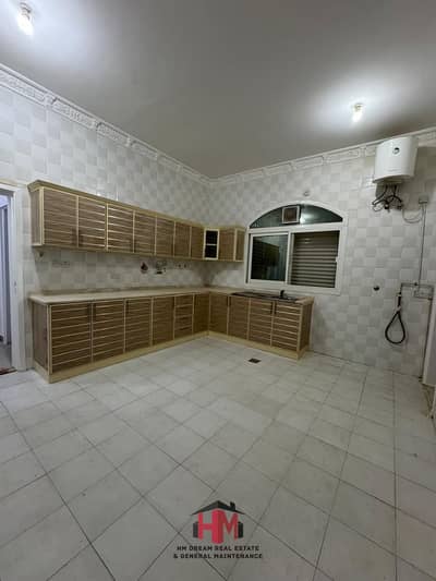 BIGG SIZE 2 BEDROOMS MAJLIS 3 BATHROOMS  FRONT OF SHOPPING MALL 50K YEARLY AT AL SHAMKHA