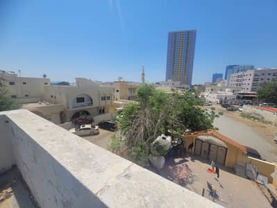 An opportunity for owners of property and investment for sale in Al Nuaimiya 3, Ajman, an Arab house, 9 rooms, fully rented, an annual income of 100,000, an area of 5,470 square feet, corner of 3 streets, and an excellent location.  For sale at a price