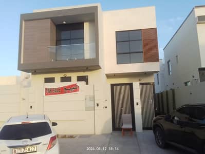 For sale, a villa in Ajman Al Zahia, 5 master rooms, a sitting room, a hall, and a maids room, free ownership for all nationalities, and the possibil