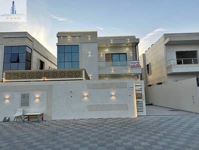 Enjoy unparalleled luxury: a 5-bedroom villa with outdoor seating in Al Hilo 2, opposite Al Hamidiya Park, without down payment and without service fe