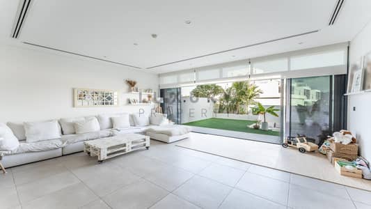 4 Bedroom Villa for Rent in Jumeirah Golf Estates, Dubai - High-End Living | Bright and Open Living Area