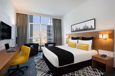 شقة فندقية 1 غرفة نوم للبيع في برشا هايتس (تيكوم)، دبي - شقة فندقية في فندق سكاي سنتر،برشا هايتس (تيكوم) 1 غرفة 1100000 درهم - 9006549