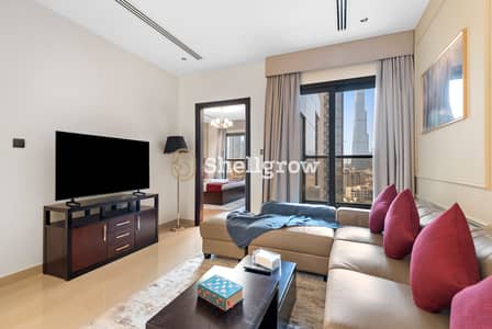 1 Bedroom Apartment for Rent in Downtown Dubai, Dubai - Living room