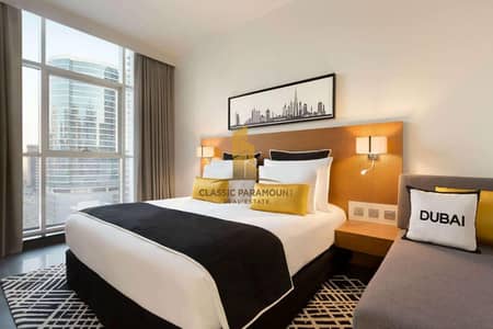 شقة فندقية  للبيع في برشا هايتس (تيكوم)، دبي - شقة فندقية في تريب باي ويندام دبي،برشا هايتس (تيكوم) 950000 درهم - 9009655