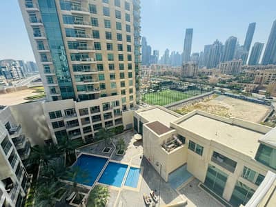1 Bedroom Apartment for Rent in Downtown Dubai, Dubai - Community and Pool View | Vacant and Ready to move in