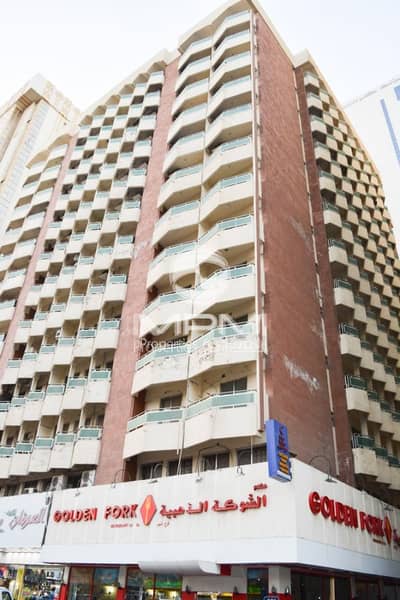 2 Bedroom Flat for Rent in Hamdan Street, Abu Dhabi - Window AC | Balcony | Spacious Rooms | 4 Chqs
