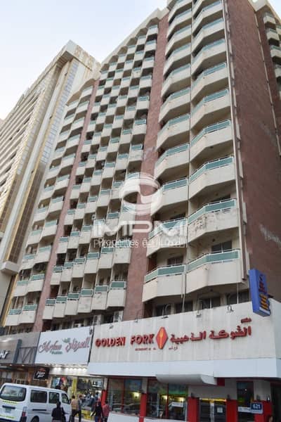 3 Bedroom Apartment for Rent in Hamdan Street, Abu Dhabi - Window AC | Balcony | Spacious Rooms | 4 Chqs