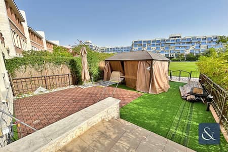 4 Bedroom Townhouse for Sale in Motor City, Dubai - 4 Bedrooms + Maids | Rented | Garden