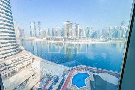 Office for Sale in Business Bay, Dubai - Fully Fitted | Rented Office | Canal View