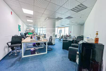 Office for Sale in Business Bay, Dubai - Fully Fitted | Rented Office | Canal View