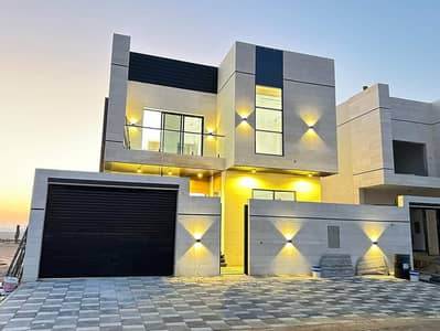 Villa including registration fees, one of the most luxurious modern villas in Ajman - excellent finishes - central air conditioning - very special loc