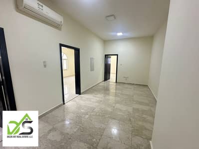 A luxurious three-bedroom apartment with a spacious living room, first floor, in Khalifa City A, near Khalifa Market, with an annual rent of 70 thousand dirhams.