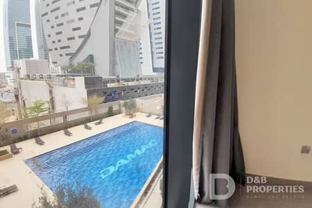 1 Bedroom Apartment for Sale in Business Bay, Dubai - Prime Location | Near Metro | Pool View