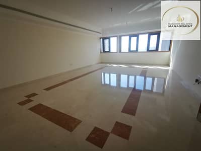 4 Bedroom Flat for Rent in Airport Street, Abu Dhabi - A Large Apartment 4BHK + Maids Room