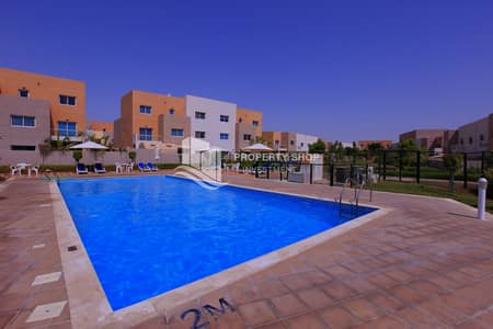 2 Bedroom Villa for Sale in Al Reef, Abu Dhabi - abu-dhabi-al-reef-villa-contemporary-village-community-swimming-pool. JPG