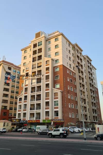 شقة 2 غرفة نوم للبيع في المدينة العالمية، دبي - trafalgar-tower-23919_xl. jpg