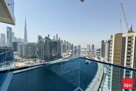 فلیٹ 2 غرفة نوم للايجار في الخليج التجاري، دبي - شقة في برج ويفز،الخليج التجاري 2 غرف 210000 درهم - 9081637