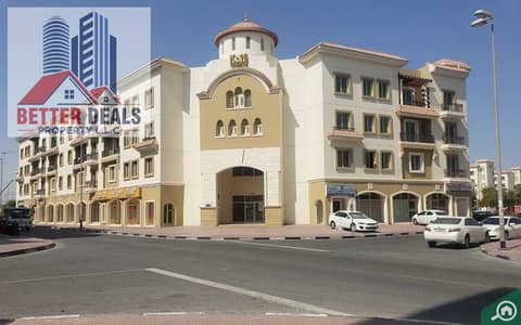 محل تجاري  للايجار في المدينة العالمية، دبي - Greece_Cluster_95649f8bb2. jpg