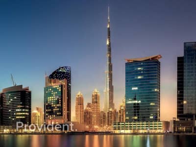 استوديو  للبيع في الخليج التجاري، دبي - شقة في ذا باراغون باي IGO،الخليج التجاري 1150000 درهم - 9086275