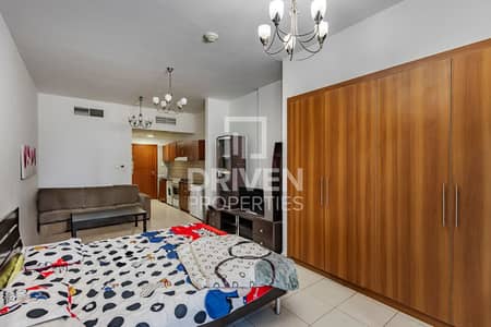 Studio for Rent in Dubai Residence Complex, Dubai - Fully Furnished Unit | Huge Terrace | Vacant