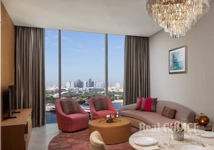 1 Bedroom Hotel Apartment for Rent in Deira, Dubai - 1 Bedroom Apartment Creek View Living room JOCH_024_051223. jpg