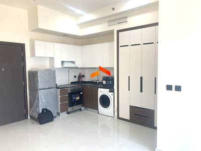 Studio for Rent in International City, Dubai - Kitchen Equipped - Balcony - Ready to move