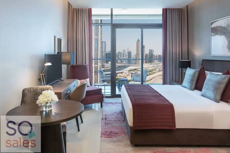 شقة فندقية  للايجار في الخليج التجاري، دبي - Studio Bedroom. jpg