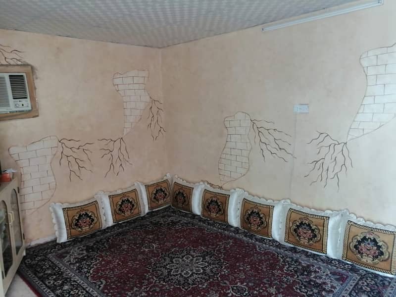 villa for sale in ajman with electricity and water and air condition