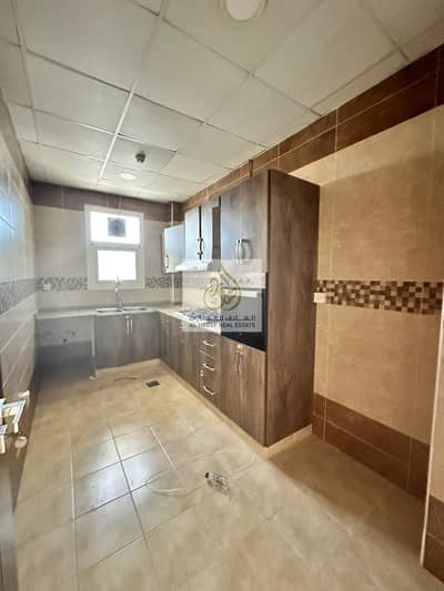Two rooms, a hall, a maids room, 3 bathrooms, and a balcony in Al Mowaihat 1 area  Large spaces and excellent finishing