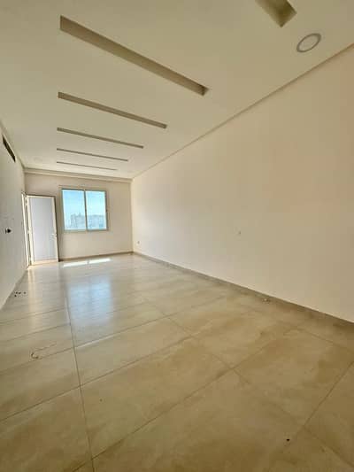 Two rooms and a hall with a maids room, large size and excellent finishing, with 3 bathrooms and a balcony in Al Mowaihat 1. The price is 50 thousand
