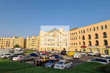 Shop for Rent in International City, Dubai - morocco-cluster-23830. jpg