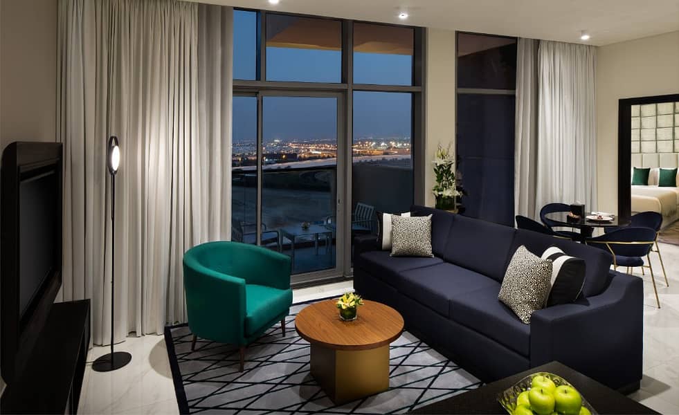 Premium 1 Bedroom Apt. Living Room nigh time Premium 1 Bedroom Apt. Living Room nigh time