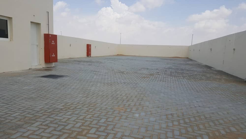 8000 sqft open yard with office interlock boundary wall in new saja sharjah