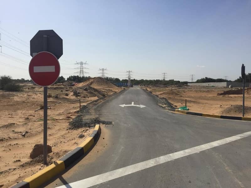 Commercial plots for sale direct in a main road in Ajman