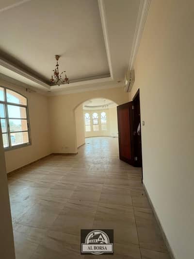 For rent a villa in Al Raqaib area, modern finishing, distinguished location close to the main street, cash in one payment