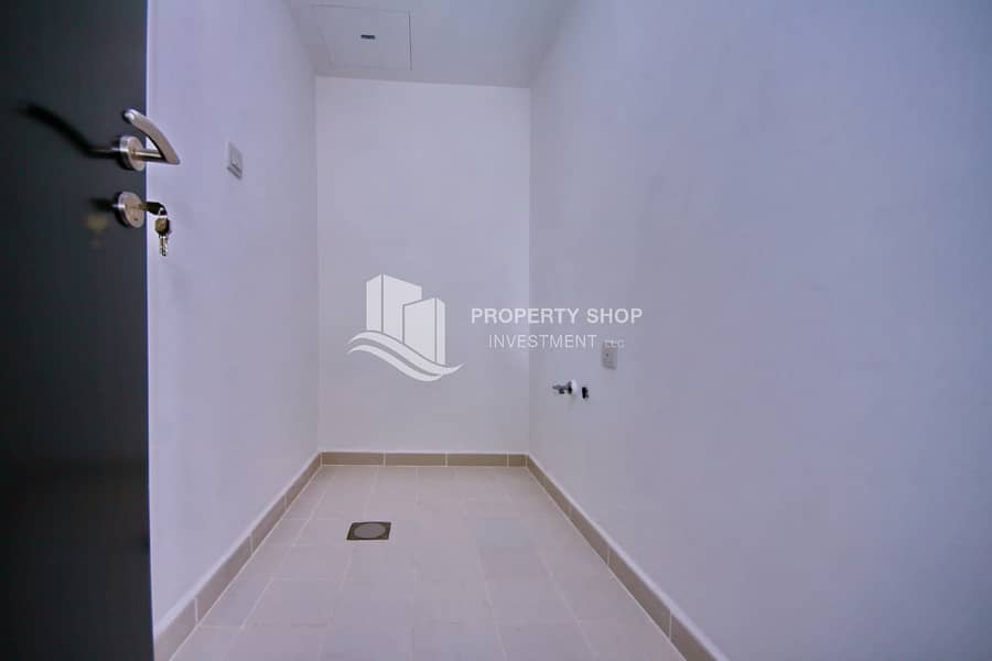 12 3 bedroom-apartment-abu-dhabi-al-reef-downtown-laundry room. JPG