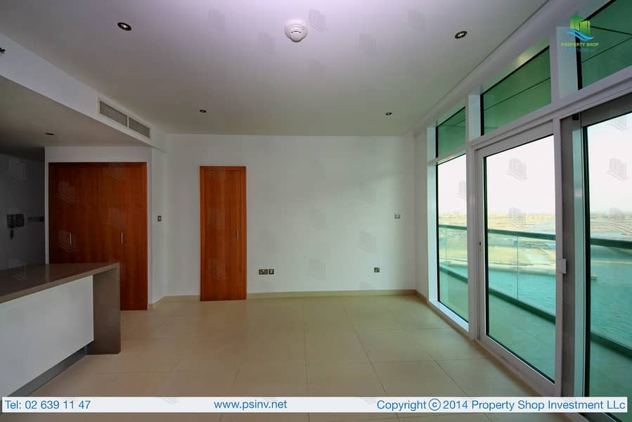 2 2-bedroom-apartment-al-raha-beach-al-bandar-al-naseem-dining-area-2. JPG
