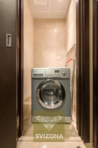 10 Nassima 1bhk s laundry room. png