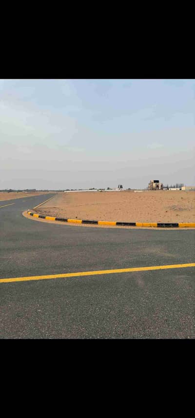 Residential land for sale in the Emirate of Sharjah For sale, corner land of two streets in the Rawdat Al-Qart area