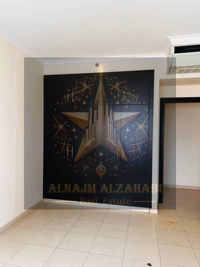 For annual rent, 3 rooms, a hall, 4 bathrooms, and a spacious kitchen with a balcony, in Al Nuaimiya 3 - Ajman