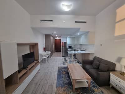 استوديو  للايجار في قرية جميرا الدائرية، دبي - Spacious Studio In New Tower || Open Kitchen  || Everything Accessible From Walking Distance