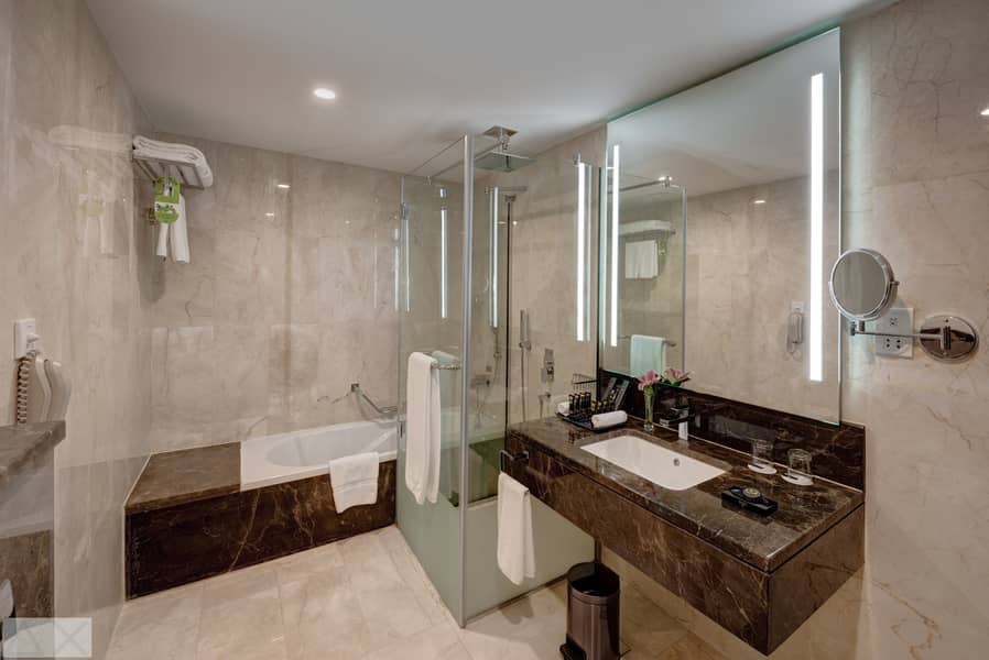 7 Ghaya Grand Hotel Dubai - Two Bedroom Bathroom 5. jpg